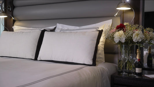 White and black decorative cushion.